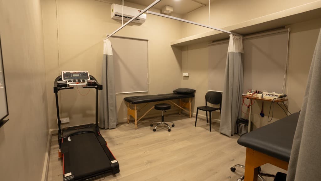 Zen Physiotherapy Nashik Road clinical treatment suites, electrotherapy bay and rehabilitation treadmill
